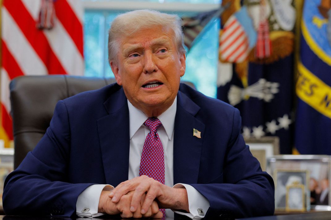 U.S. President Donald Trump speaks with the media on the day of the signing of an executive order to rename the Department of Defense the "Department of War", in the Oval Office, at the White House in Washington, D.C., U.S., September 5, 2025. REUTERS/Brian Snyder 