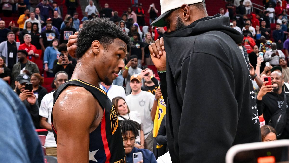 High School Basketball: McDonald s All American Boy s Game Mar 28, 2023; Houston, TX, USA; McDonald s All American West guard Bronny James (6) speaks with his father, LeBron James of the Los Angele...