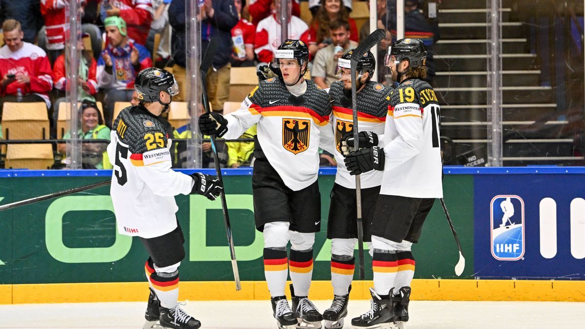 ODENSE, DENMARK - MAY 17: Leon Huttl of Germany L) celebrate a goal with Joshua Samanski of Germany, scorer Eric Mik of Germany and Wojciech Stachowiak of Germany R) during the 2025 Ice hockey, Eis...