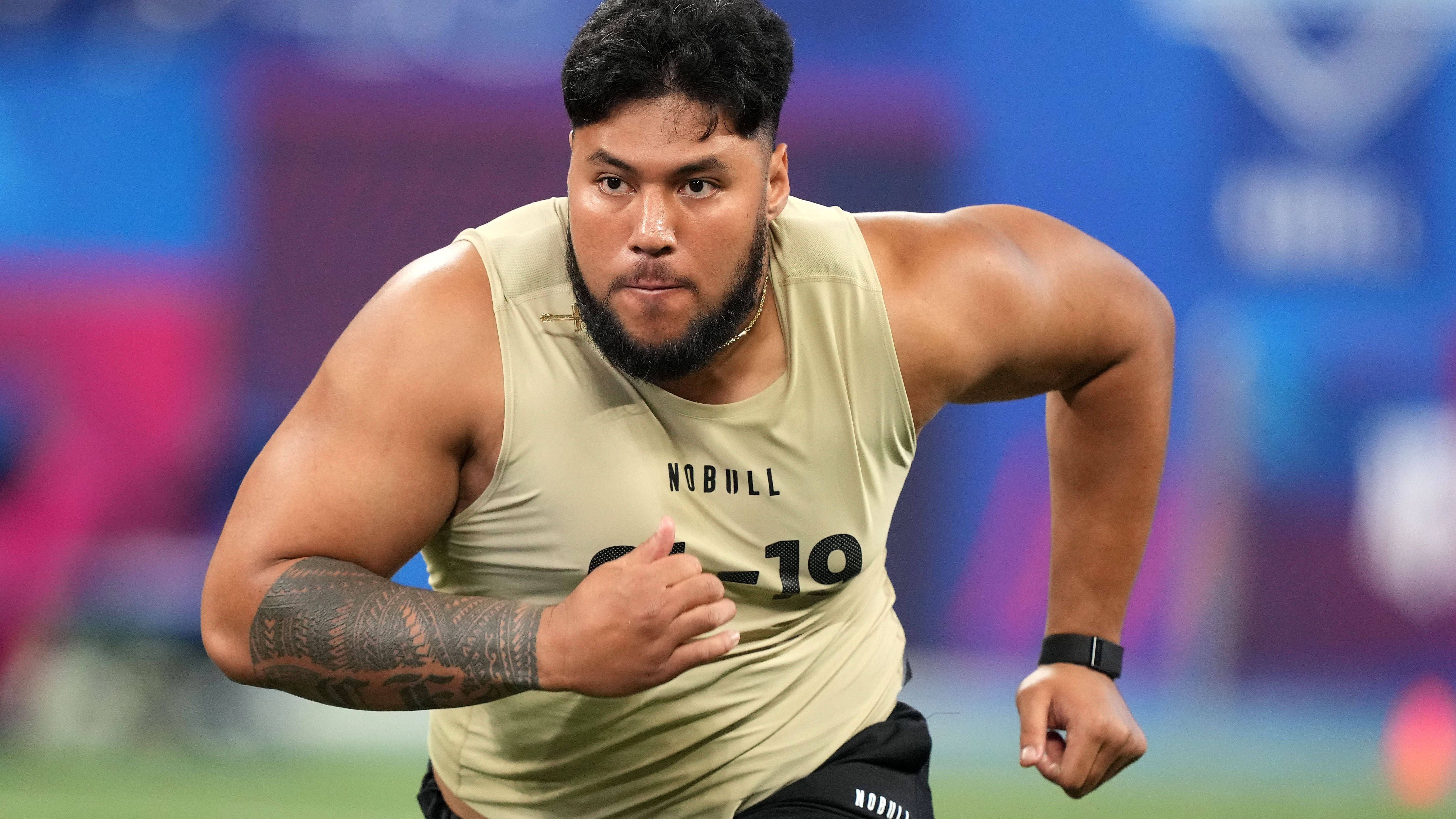 <strong>Pick 21: Miami Dolphins: Troy Fautanu, OL, Washington</strong><br> Die Dolphins holen sich Vielseitigkeit für ihre Offensive Line.