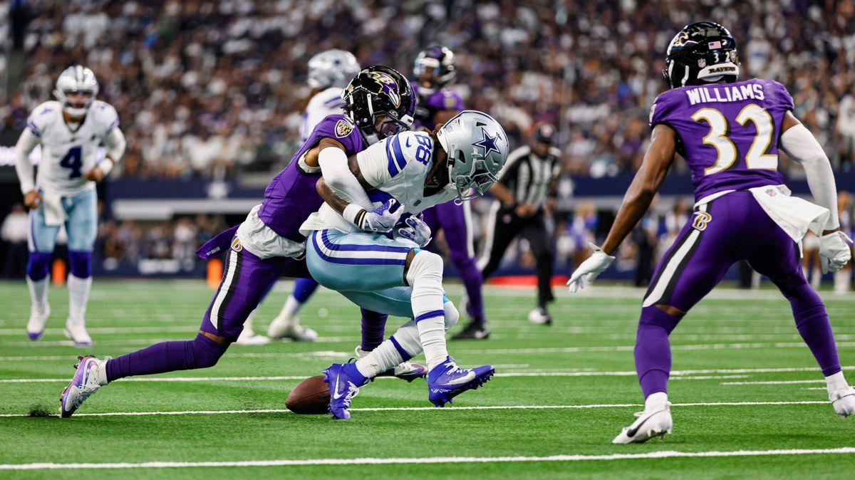 ARLINGTON, TX - SEPTEMBER 22: Baltimore Ravens cornerback Nate Wiggins (2) knocks the ball loose from Dallas Cowboys wide receiver CeeDee Lamb (88) for a fumble during the game between the Dallas C...