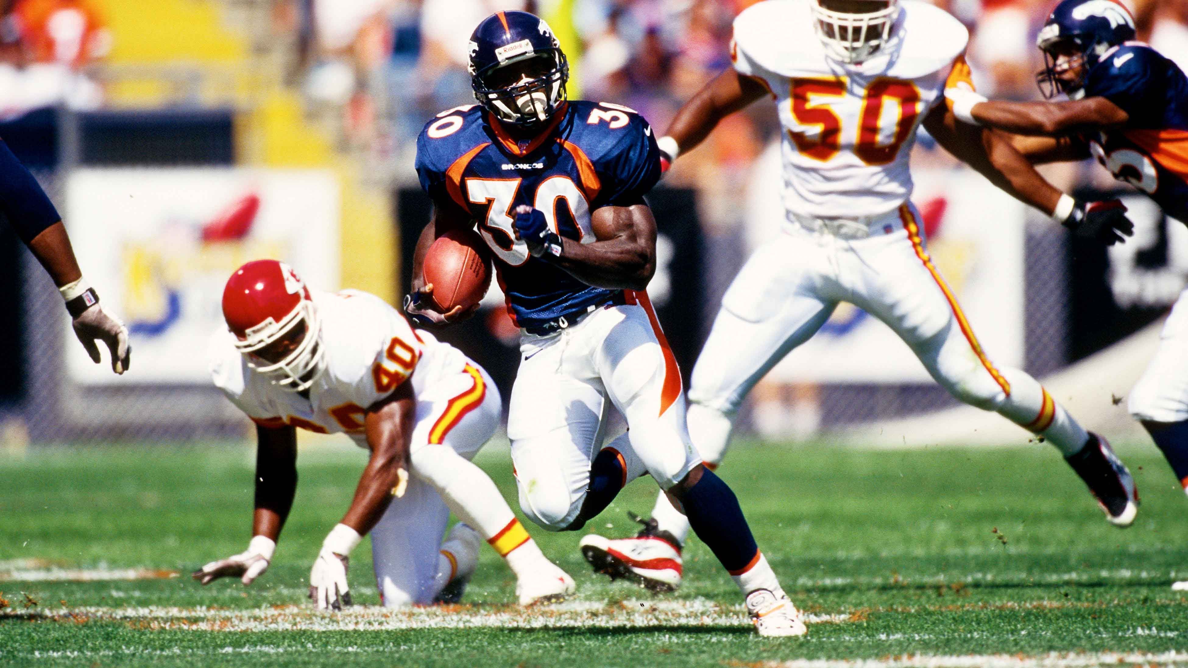 
                <strong>Denver Broncos: Terrell Davis</strong><br>
                7.607 Yards bei 1.655 Runs - 60 Touchdowns
              