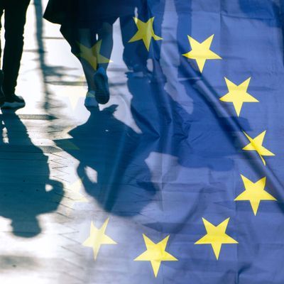 EU or European Union Flag and shadows of people, concept political picture	