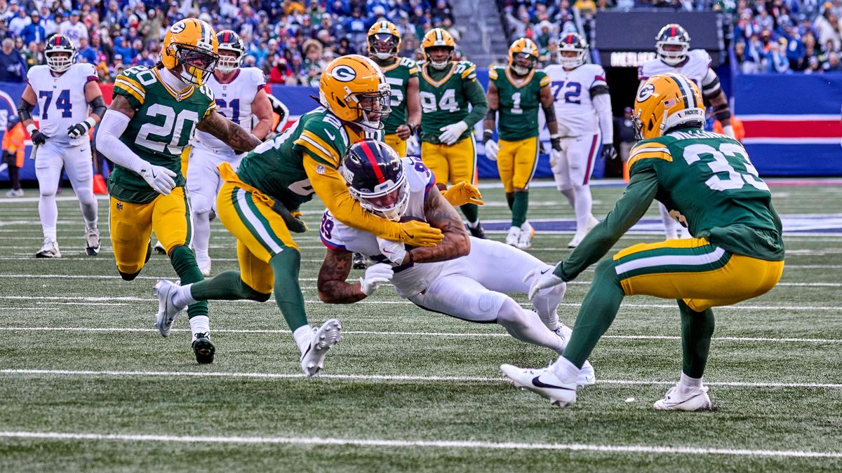 New York Giants wide receiver Lil Jordan Humphrey (89) is tackled by Green Bay Packers safety Xavier McKinney (29) after a catch and run during a NFL, American Football Herren, USA game at MetLife ...