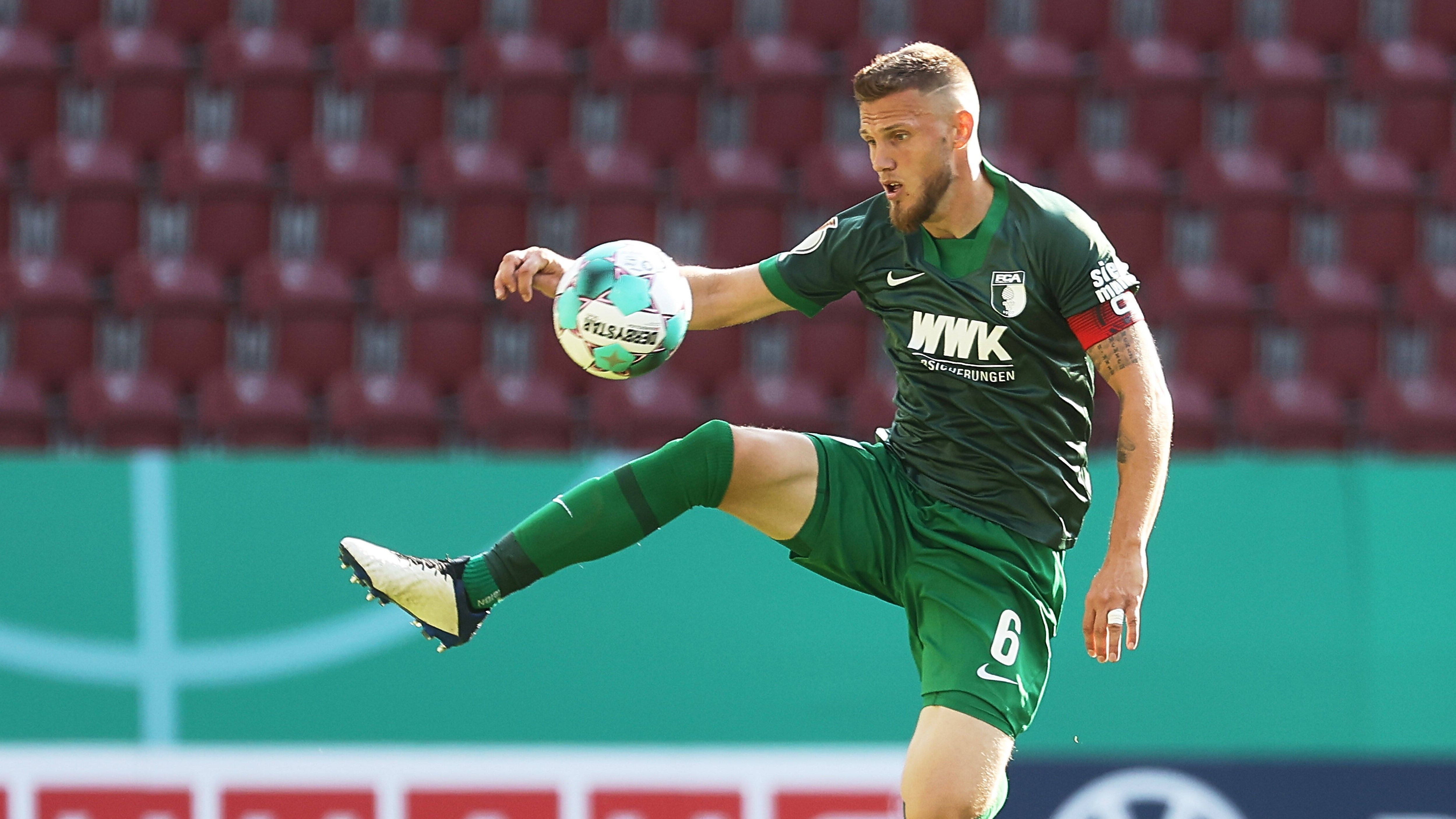 
                <strong>FC Augsburg</strong><br>
                1. Jeffrey Gouweleeuw (Kapitän) Weitere Mitglieder: Alfred Finnbogason, Rani Khedira, Daniel Caligiuri, Tobias Strobl
              