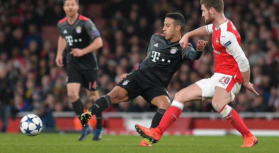 
                <strong>Thiago (FC Bayern München)</strong><br>
                Thiago: Der Spanier agierte im ersten Durchgang nur wie ein Schatten der vergangenen Wochen. War bei Arsenals Angriffen kaum im Bilde und lud den Gegner dann auch noch mit einer völlig planlosen Ecke zum Konter ein. Verschaffte dem Bayern-Spiel nach der Pause jedoch wieder Struktur und hatte seinen Anteil an der erfolgreichen Reise nach London. Wurde in der Schlussphase geschont. ran-Note: 3
              