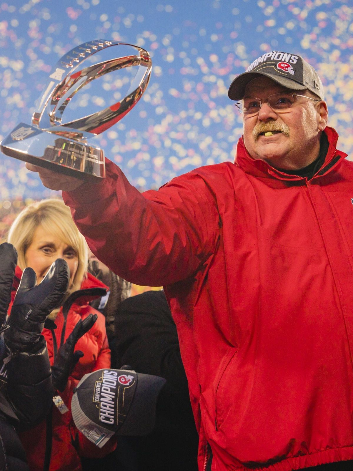 Kansas City Chiefs head coach Andy Reid receives the Lamar Hunt Trophy after the Kansas City Chiefs defeats the Tennessee Titans in the AFC Championship game at Arrowhead Stadium in Kansas City, Mi...