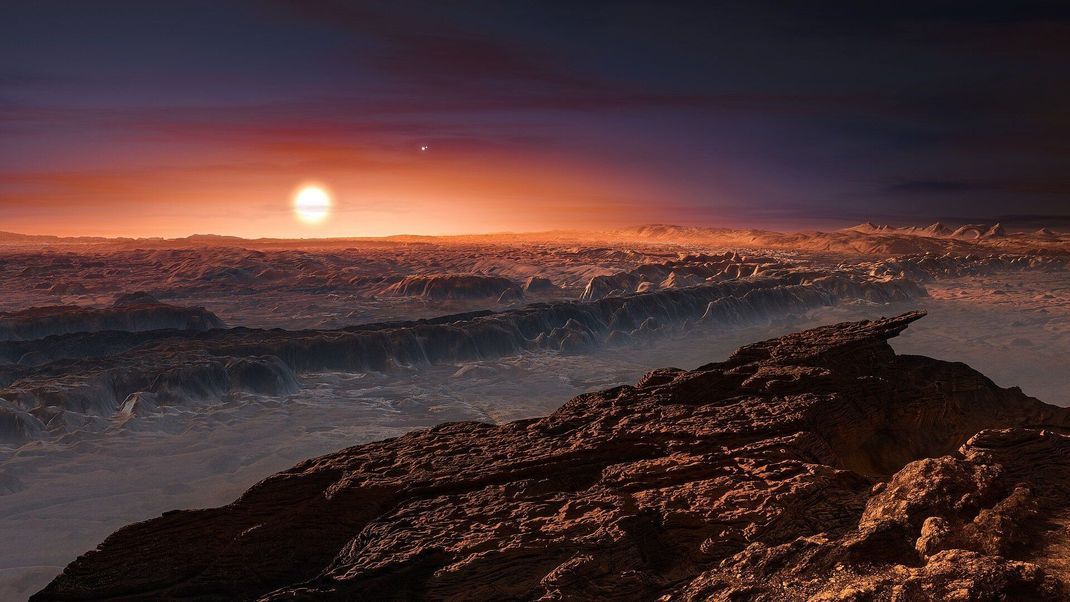 Fremde Welt: So schwach könnte ein Roter Zerg von einem fiktiven Exoplaneten aus gesehen leuchten.