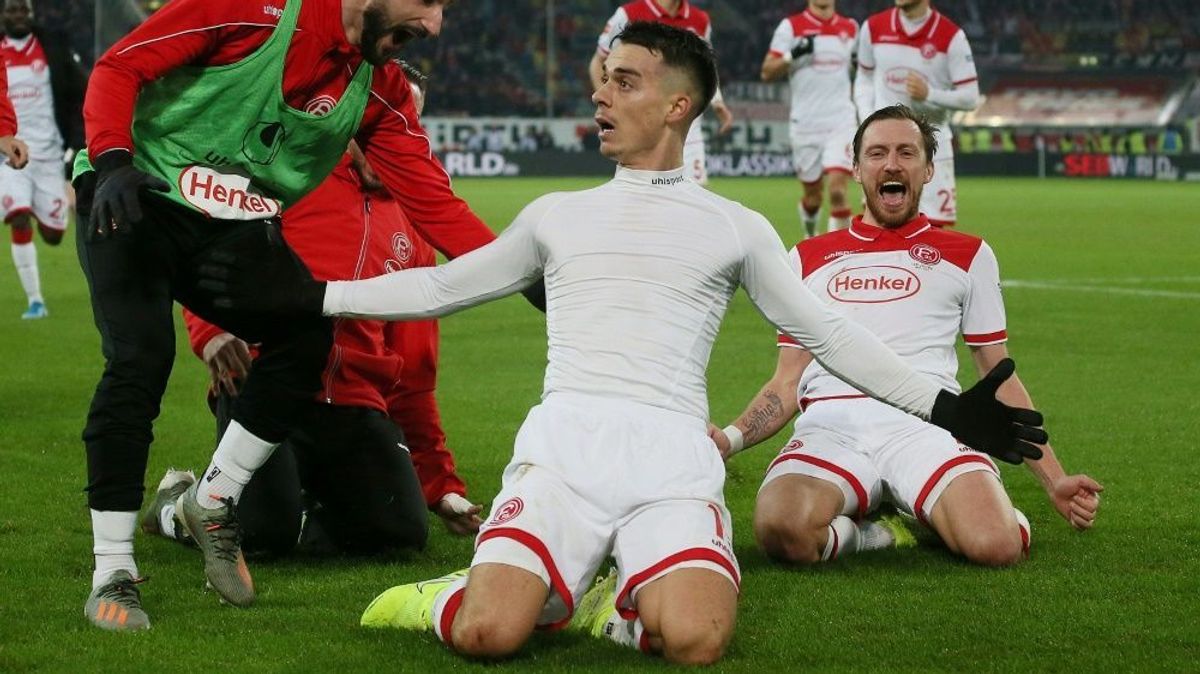 Erik Thommy (vorne) sichert der Fortuna drei Punkte