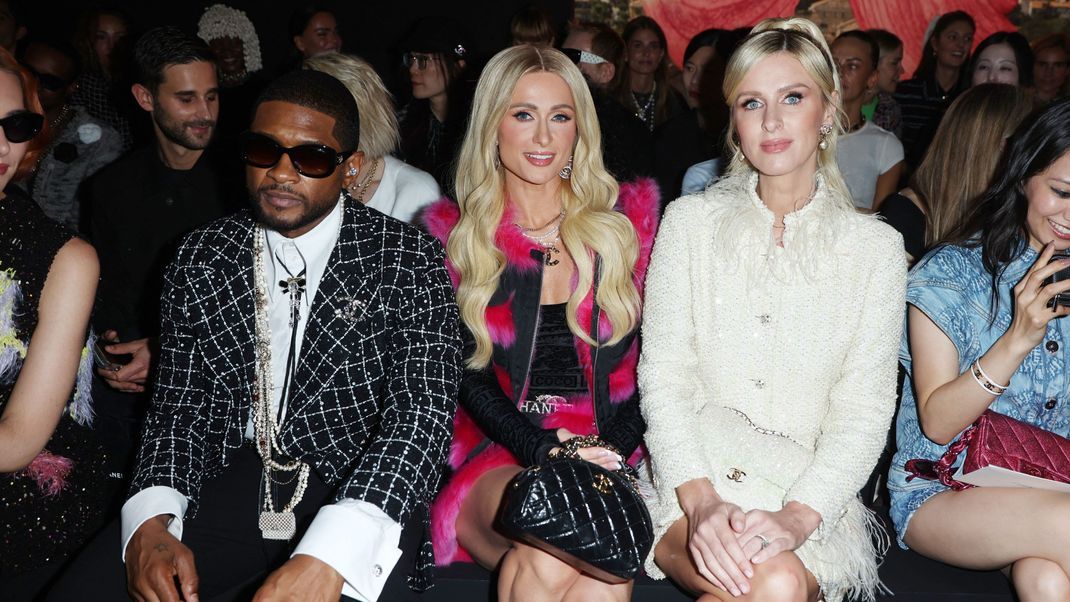 Usher, Paris Hilton und Nicky Hilton bei der Chanel-Show in Paris.