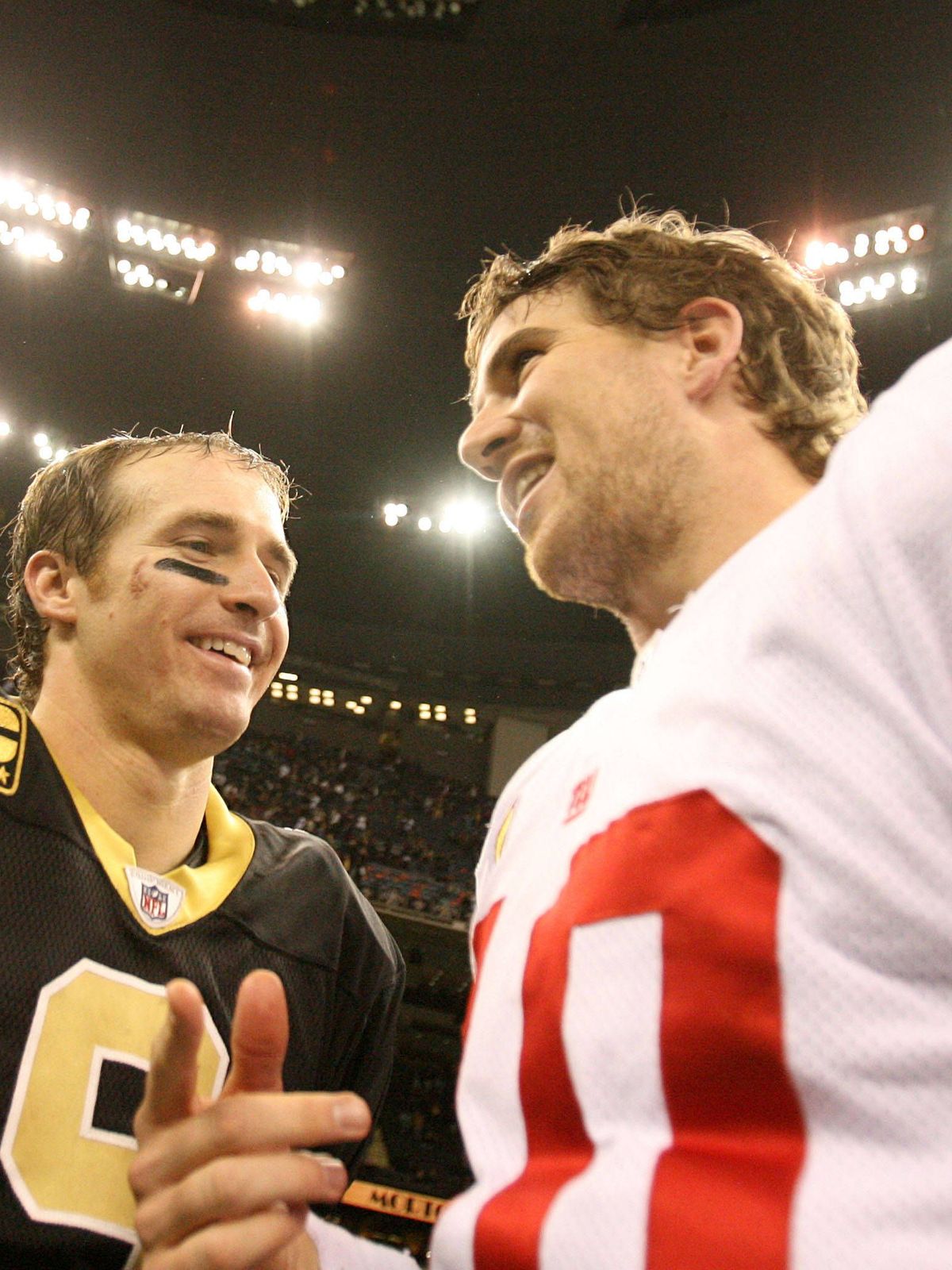 Nov. 28, 2011 - New Orleans, Louisiana, U.S. - (left to right) New Orleans Saints quarterback DREW BREES talks with New York Giants quarterback ELI MANNING at the Mercedes-Benz Superdome after a re...