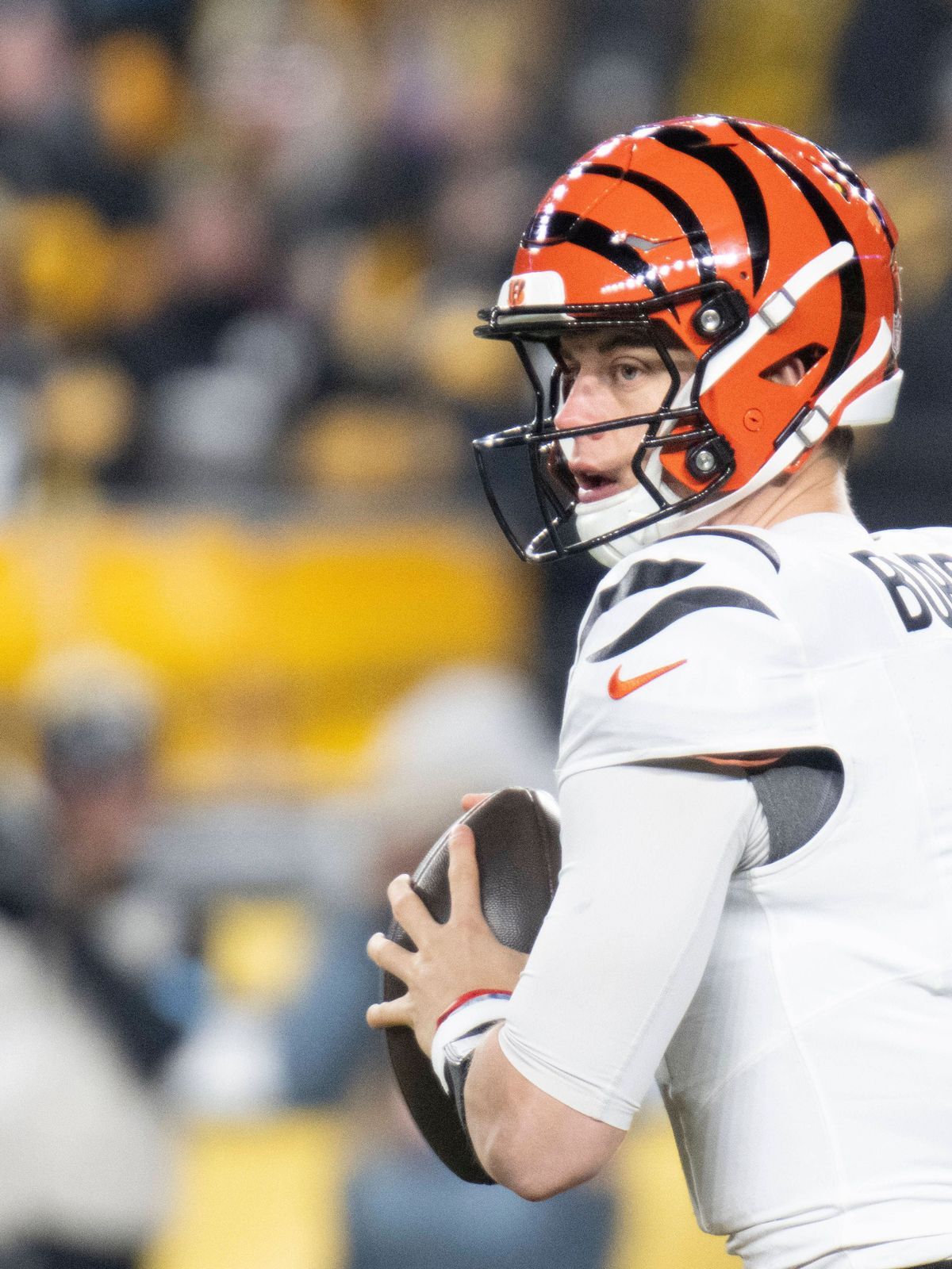 PITTSBURGH, PA - January 04: Cincinnati Bengals quarterback Joe Burrow (9) looks down the field for a receiver during the game between the Pittsburgh Steelers and the Cincinnati Bengals at Acrisure...