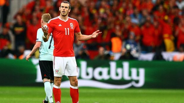 
                <strong>Gareth Bale</strong><br>
                Gareth Bale: Überließ anderen die Tore, wurde natürlich immer wieder gesucht, vor allem bei den zahlreichen Kontern. Der Superstar der Waliser arbeitete viel, blieb dabei aber auch glücklos. ran-Note: 3
              