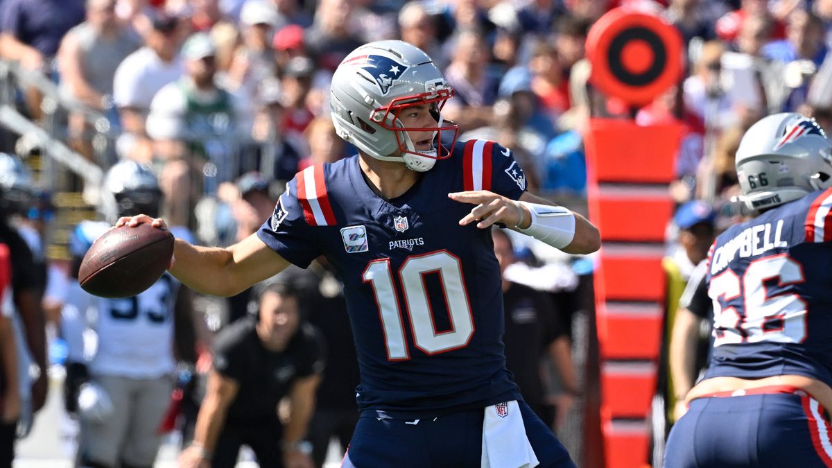 Sep 28, 2025; Foxborough, Massachusetts, USA; New England Patriots quarterback Drake Maye (10) throws a pass against the Carolina Panthers during the first half at Gillette Stadium, in Foxborough, ...