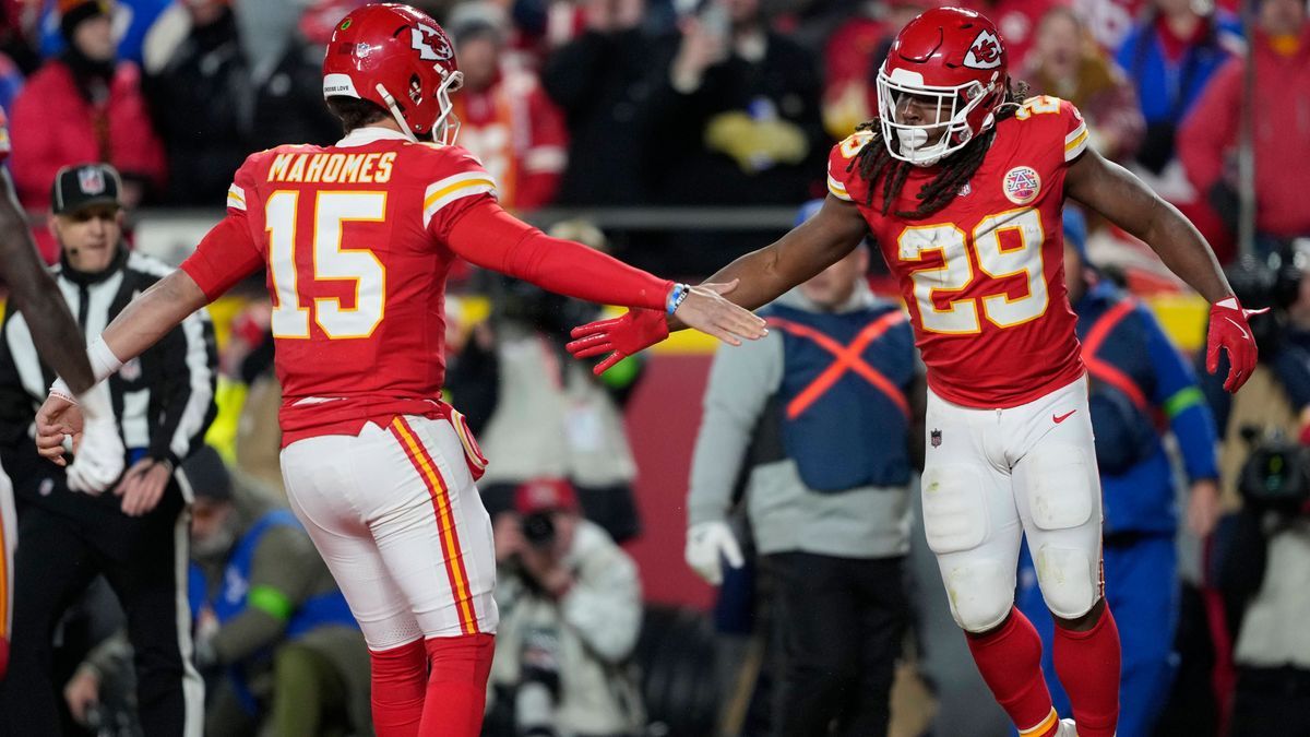 Kansas City Chiefs quarterback Patrick Mahomes (15) and running back Kareem Hunt (29) celebrate a touchdown in the first quarter against the Buffalo Bills at Arrowhead Stadium in Kansas City, Misso...