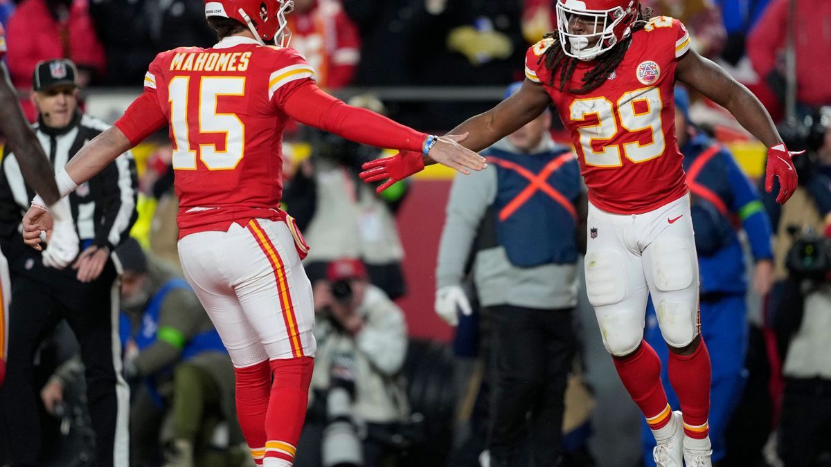 Kansas City Chiefs quarterback Patrick Mahomes (15) and running back Kareem Hunt (29) celebrate a touchdown in the first quarter against the Buffalo Bills at Arrowhead Stadium in Kansas City, Misso...