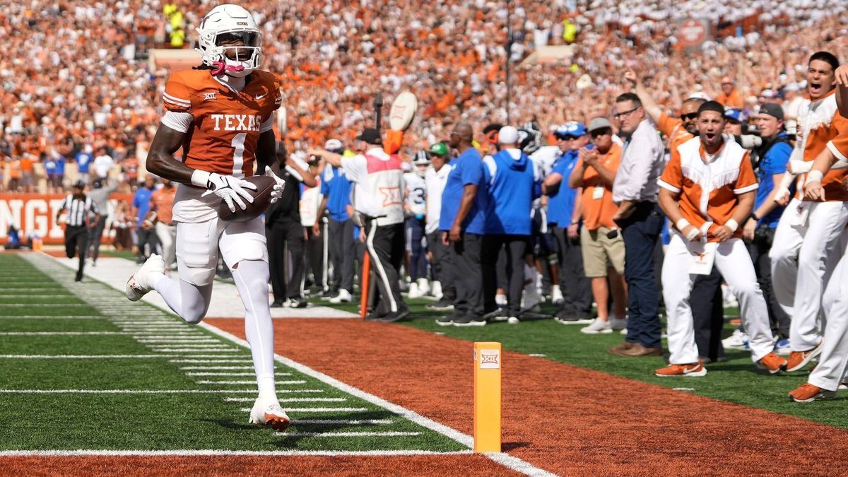 Syndication: Austin American-Statesman Texas Longhorns punt returner Xavier Worthy scores a touchdown on a punt return against the BYU Cougars in the first quarter at Royal-Memorial Stadium on Satu...