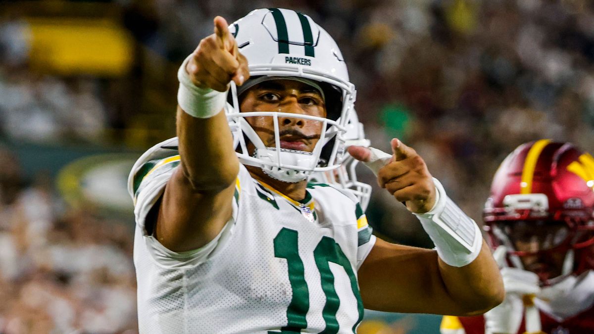 Green Bay Packers quarterback Jordan Love reacts after running for a first down in the first half of the NFL, American Football Herren, USA game between the Washington Commanders and the Green Bay ...