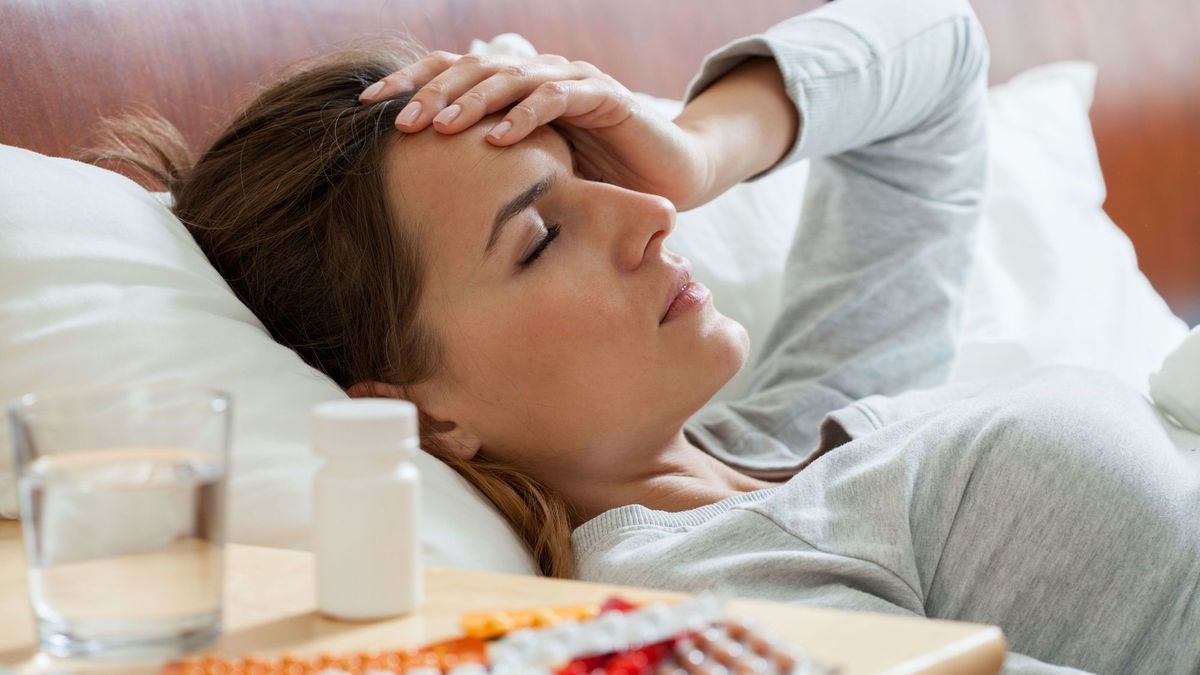Frau leiden Grippe