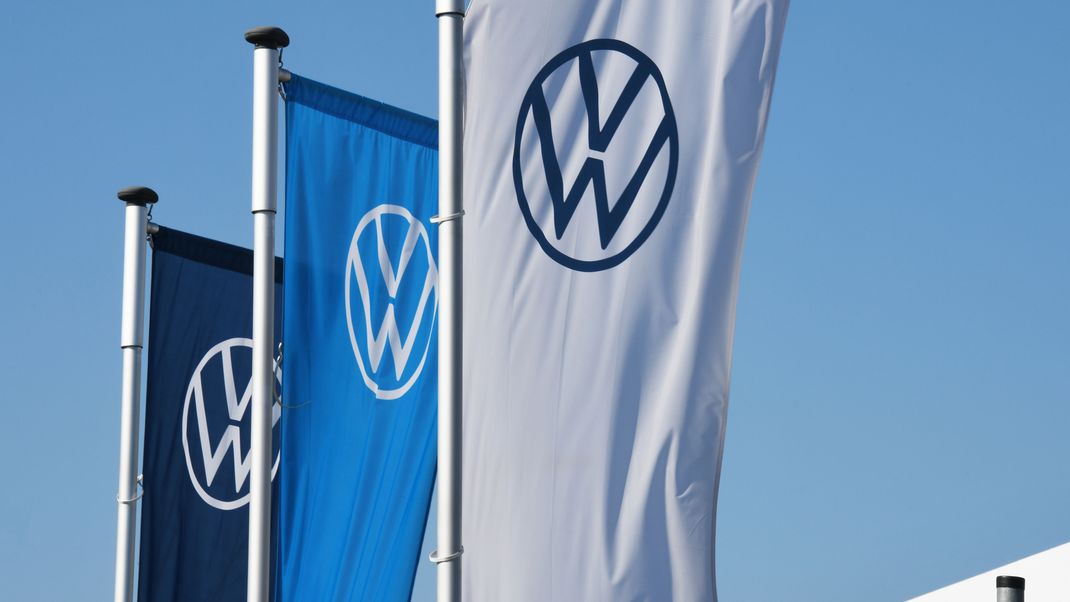 Hanover, Lower Saxony / Germany - April 5, 2020: Flags with the new logo of AG in Hanover, Germany -is one of the world's leading manufacturers of automobiles