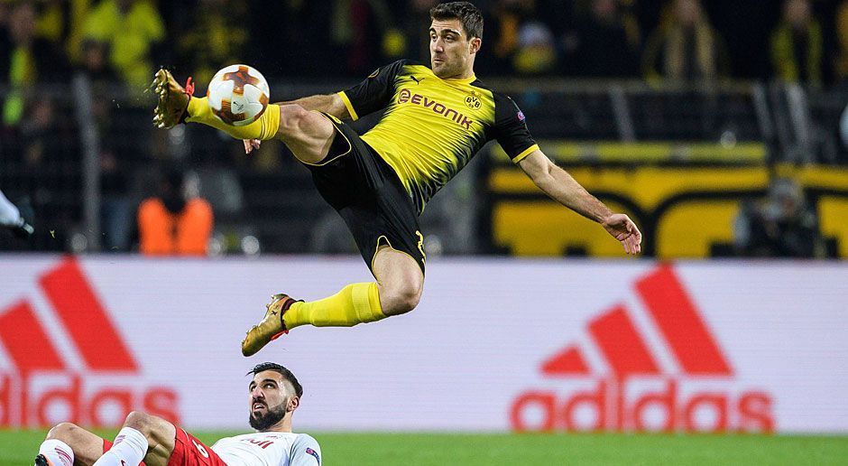 
                <strong>Sokratis</strong><br>
                Der Abwehrchef ist nicht in jeder Szene voll konzentriert, was den Gästen einige Chancen beschert. Bei Ballbesitz lebt er auch seinen Offensivdrang aus. An den Gegentoren trifft Sokratis keine direkte Schuld, aber gerade beim 0:2 passt die defensive Aufteilung nicht. Auf Schmelzer-Freistoßflanke vergibt er die Ausgleichschance in bester Position per Kopf. ran-Note: 4
              