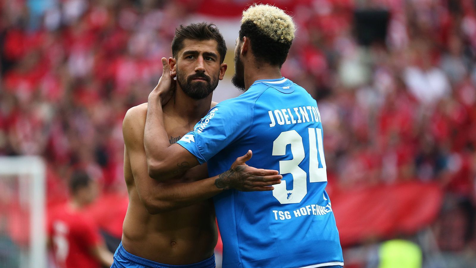 
                <strong>32. Platz (bester deutscher Klub) - TSG Hoffenheim: 85,08 Mio. </strong><br>
                Teuerste Verpflichtungen: Diade Samassekou (12 Mio.), Munas Dabbur (12 Mio.), Andrej Kramaric (11 Mio.) - Teuerste Abgänge: Joelinton (Bild re., 44 Mio.), Roberto Firmino (41 Mio.), Kerem Demirbay (li., 32 Mio.)
              
