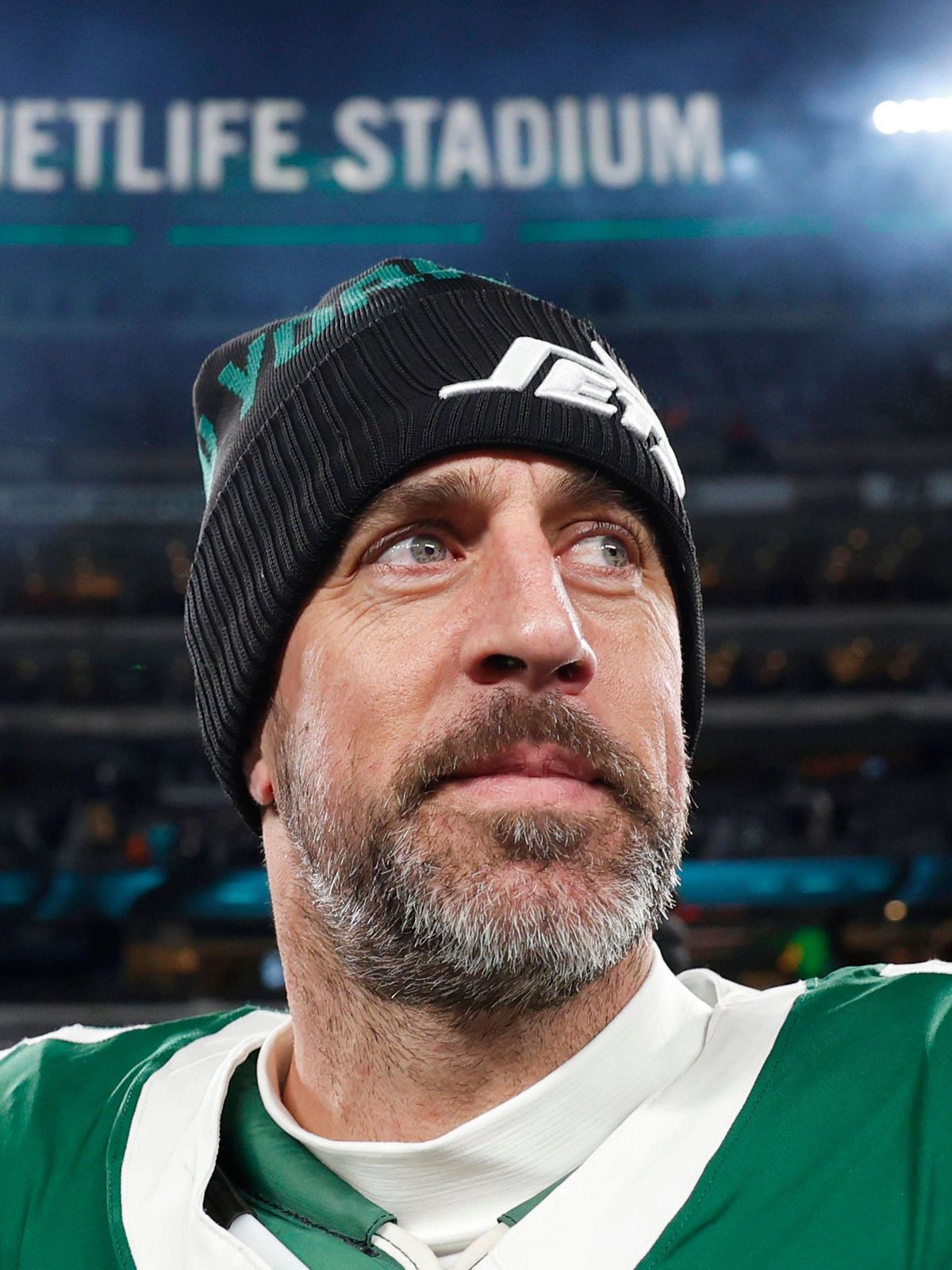 New York Jets quarterback Aaron Rodgers walks on the field after the game against the Miami Dolphins where he threw his 500th touchdown pass in his 20-year career in the final week of the NFL, Amer...