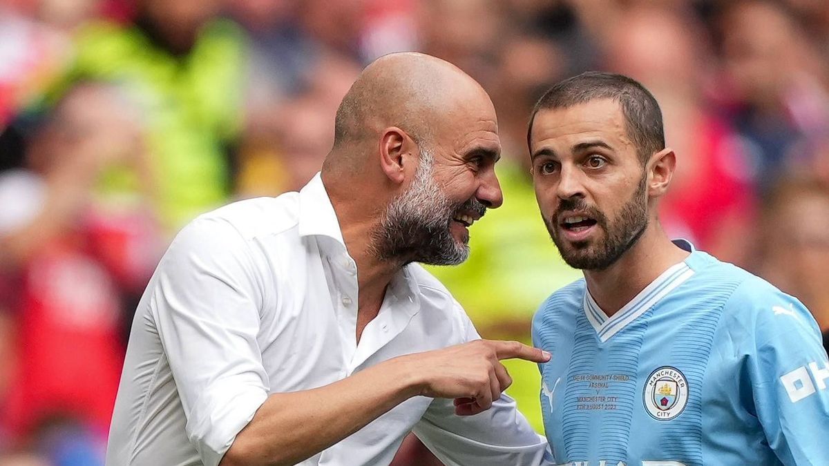 Man City manager Pep Guardiola & Bernardo Silva of Man City during the The FA Community Shield Final 2023 match between Arsenal and Manchester City at Wembley Stadium, London, England on 6 August 2...