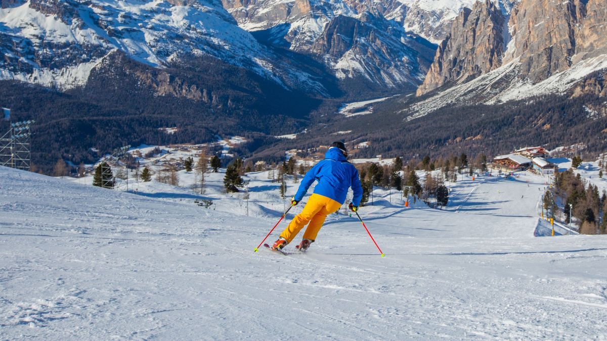 Alpine skier on slope at Cortina