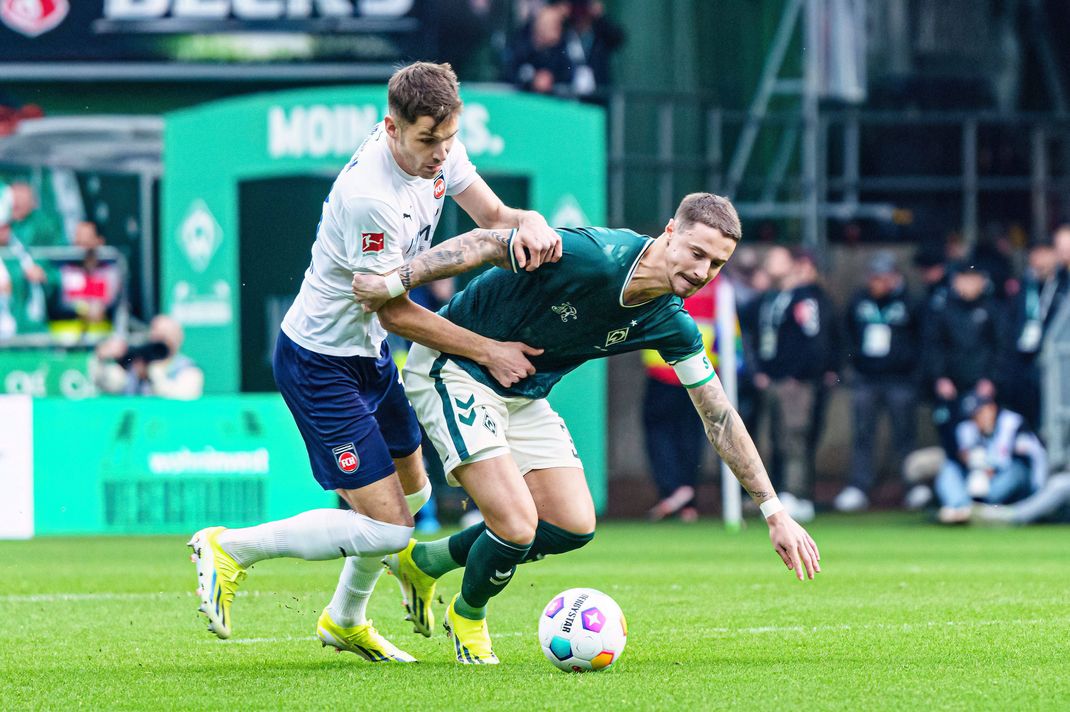 Marvin Pieringer (l.) und der 1. FC Heidenheim gewannen bei Werder Bremen