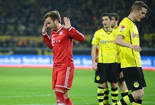 
                <strong>Mario Götze</strong><br>
                Borussia Dortmund gegen Bayern München: per se schon ein heißes Duell. Die Rückkehr von Mario Götze bringt am 13. Spieltag der Saison 2013/14 noch mehr Pfeffer in die Partie. Ausgerechnet Götze trifft zum 1:0 und "entschuldigt" sich im Anschluss
              