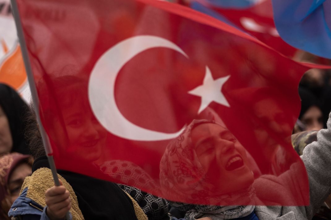 Supporters of People's Alliance's presidential candidate Recep Tayyip Erdogan, chant slogans during an elections campaign rally in Istanbul, Turkey, Friday, May 12, 2023. (AP Photo/Khalil Hamra)