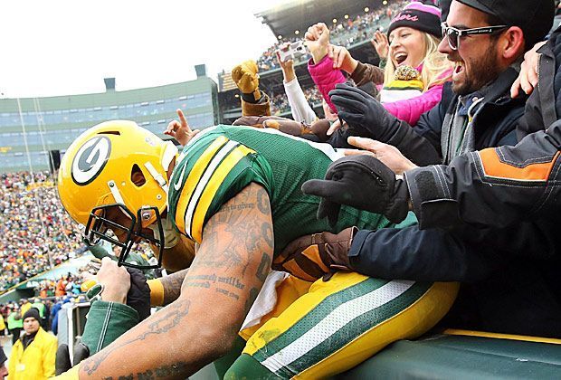 
                <strong>Dallas Cowboys vs. Green Bay Packers</strong><br>
                Andrew Quarless feiert nach einem genauen Zuspiel seines Quarterbacks Aaron Rodgers den ersten Touchdown des Spiels gemeinsam mit den Fans. In der ersten Halbzeit haben die Packers anschließend allerdings nicht mehr viel Grund zu jubeln ...
              