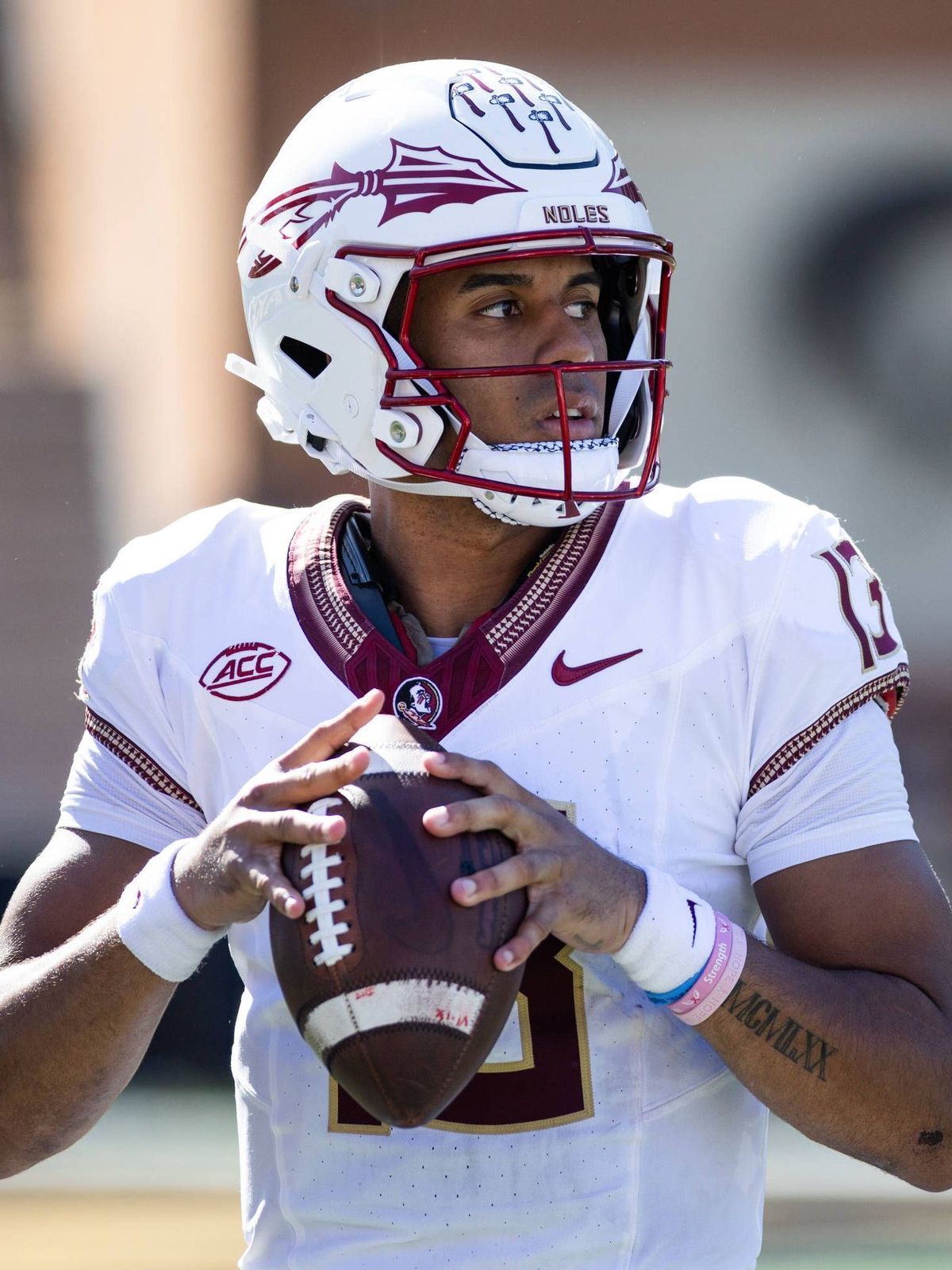 October 28, 2023: Florida State Seminoles quarterback Jordan Travis (13) stays loose on the sideline between plays during the NCAA, College League, USA football game between the Florida State Semin...