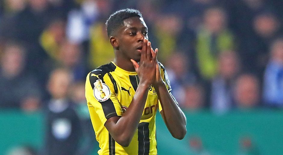 
                <strong>Ousmane Dembele</strong><br>
                Ousmane Dembele: Wie bei den anderen Akteuren in der BVB-Offensive, missglücken auch bei Dembele die meisten Aktionen: Mal springt der Ball zu weit weg, mal ist das Zuspiel zu ungenau. Trotzdem ist der Franzose vorne noch der auffälligste Dortmunder. In Minute 56 der Wegbereiter für das 1:0 durch Pulisic. Und auch selbst fast noch mit einem Tor. ran-Note: 2,5
              