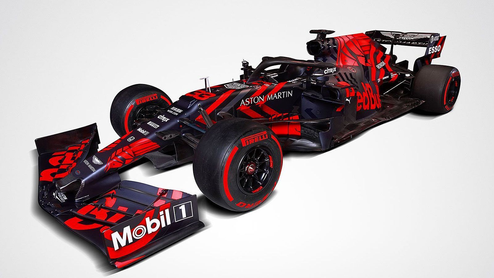 
                <strong>Formel-1-Autos 2019: Aston Martin Red Bull Racing</strong><br>
                Mit einem etwas gewöhnungsbedürftigen Design kommt der neue Rennwagen von Red Bull Racing daher. Das Gelb an Nase und Haiflosse hinter dem Cockpit ist verschwunden. Dafür wird die dunkelblaue Grundfarbe immer wieder von roten Schriftzügen unterbrochen. So sollte der RB15 auch beim Nachtrennen in Singapur gut zu sehen sein.
              