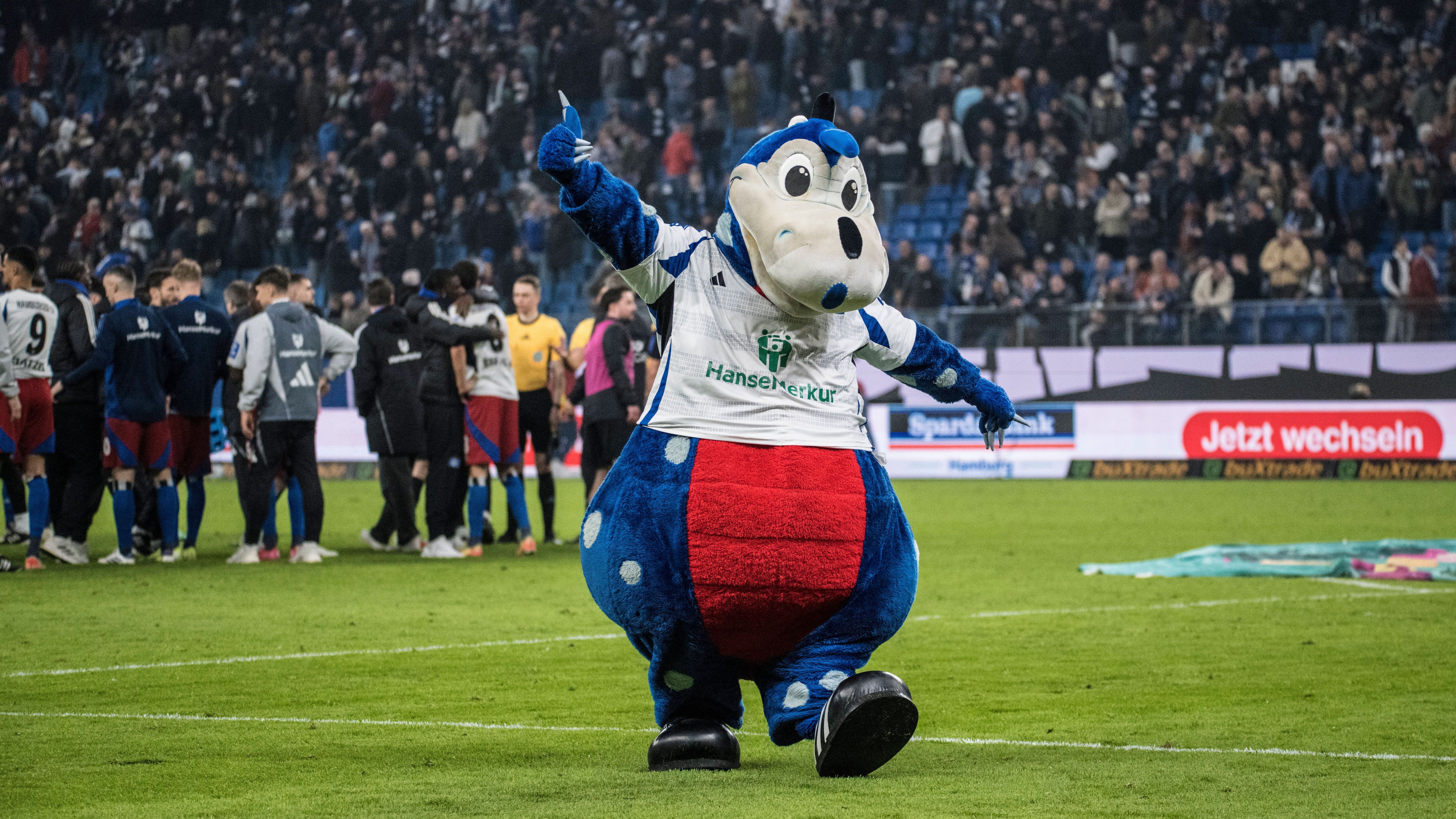 <strong>Platz 4: Hamburger SV - Dino Hermann</strong><br>Er ist - endlich - zurück. Sieben lange Jahre - 2555 Tage - war der HSV zweitklassig. Nach dem Abstieg 2018 dachte schon viele, der "Bundesliga-Dino" sei ausgestorben. Doch nach dem Überleben der Gezeiten und diverser Meteore ist Mr. Hermann wieder da! Unerschütterlich.