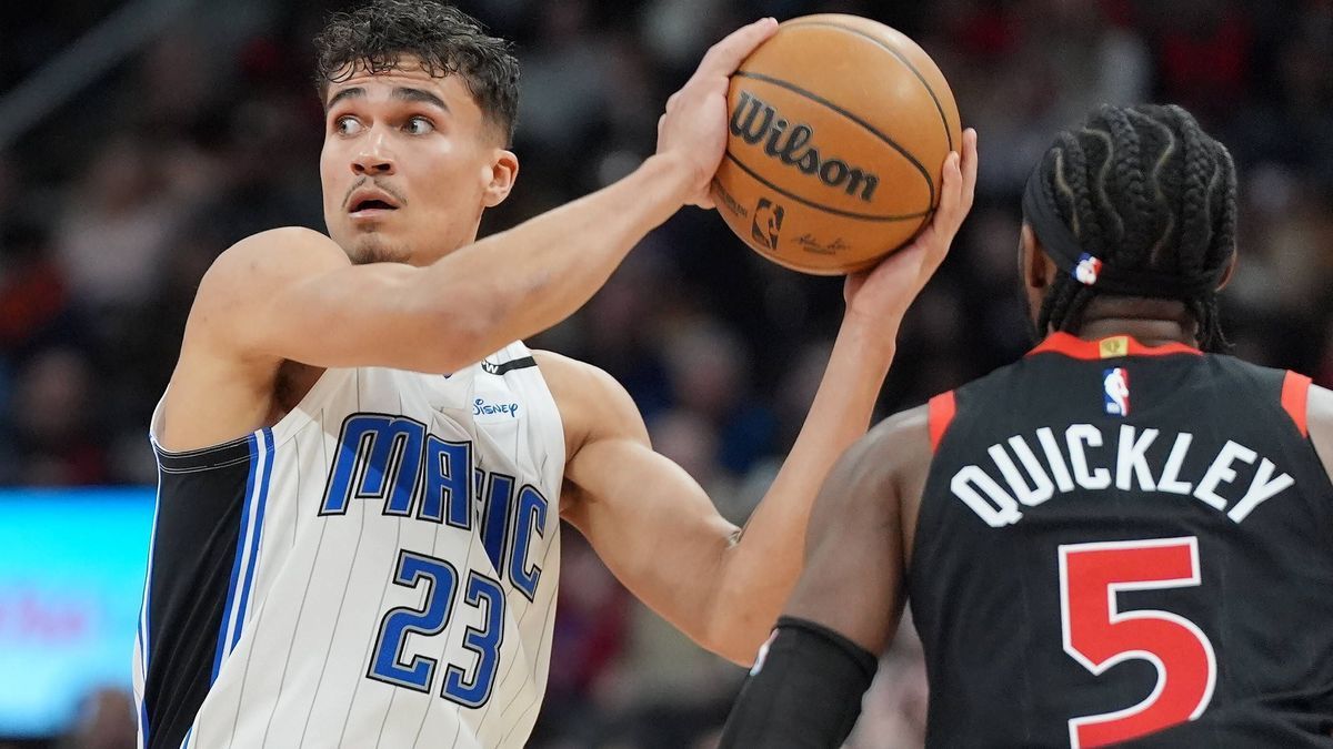 January 3, 2025, Toronto, On, Canada: Orlando Magic forward Tristan da Silva (23) looks to pass the ball as Toronto Raptors guard Immanuel Quickley (5) defends during second half NBA, Basketball He...