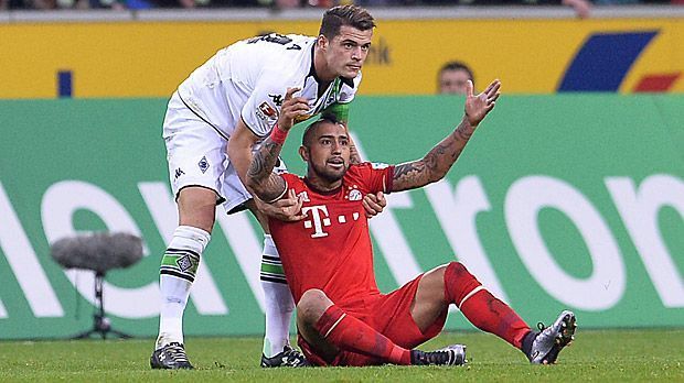 
                <strong>Granit Xhaka (Borussia Mönchengladbach)</strong><br>
                Granit Xhaka (Borussia Mönchengladbach): Arbeitet in der Zentrale gewohnt wie ein Schweizer Uhrwerk. Der Kapitän geht keinem Zweikampf aus dem Weg. Defensiv mit ungewohnten Schwächen – unter anderem unterläuft ihm ein unnötiges Foul in Strafraumnähe. ran-Note: 2
              