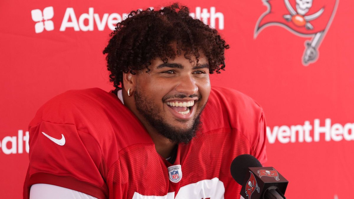 July 29, 2024, Tampa, Florida, USA: Tampa Bay Buccaneers tackle Tristan Wirfs (78) smiles as he talks with reporters during interviews after Bucs training camp at AdventHealth Training Center, on J...