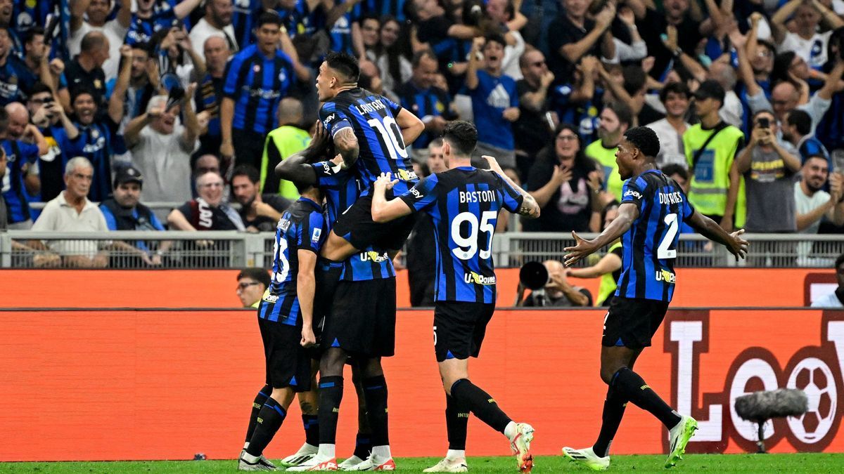 Marcus Thuram of FC Internazionale celebrates with Lautaro Martinez and teammates after scoring the goal of 2-0 during the Serie A football match between FC Internazionale and AC Milan at San Siros...