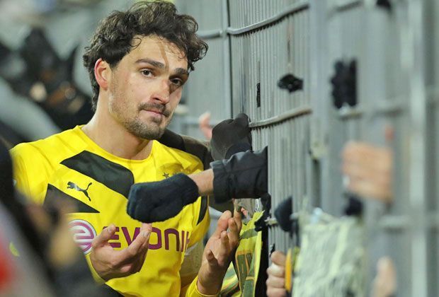 
                <strong>BVB: Gesichter der Krise</strong><br>
                Kapitän Mats Hummels ist Weltmeister und einer gefragtesten Verteidiger Europas. Doch direkt nach der Niederlage gegen Augsburg sieht er wie die personifizierte Ratlosigkeit aus.
              
