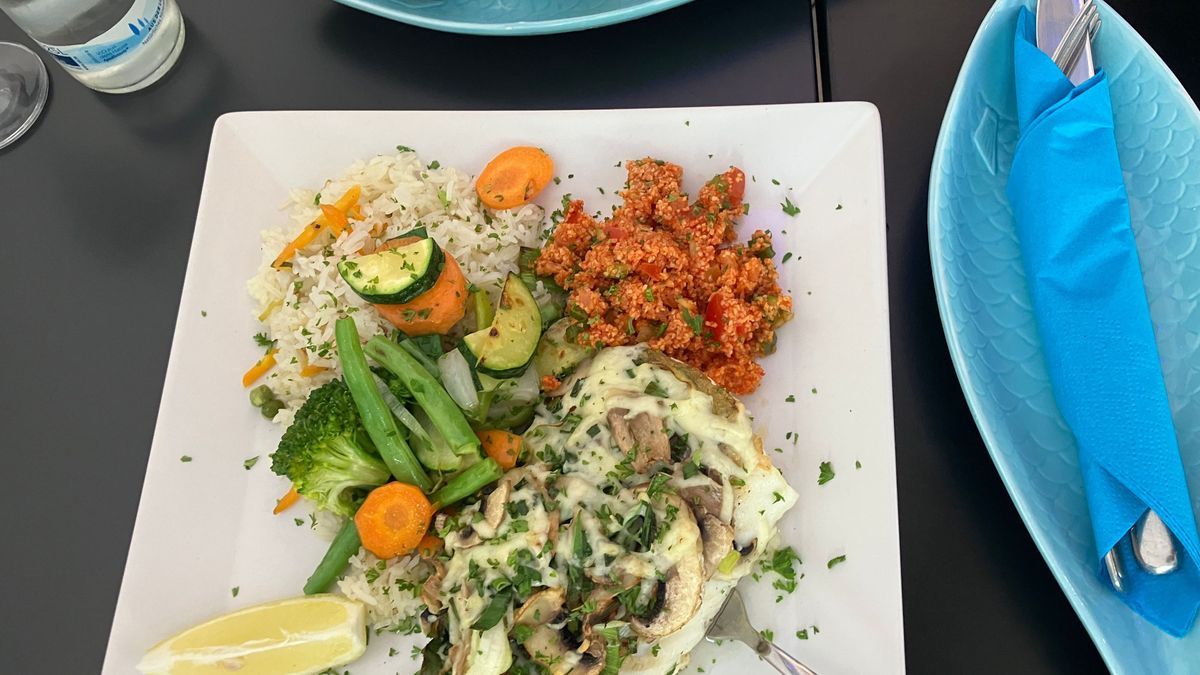 Kabeljaufilet mit Champignons und Käse überbacken