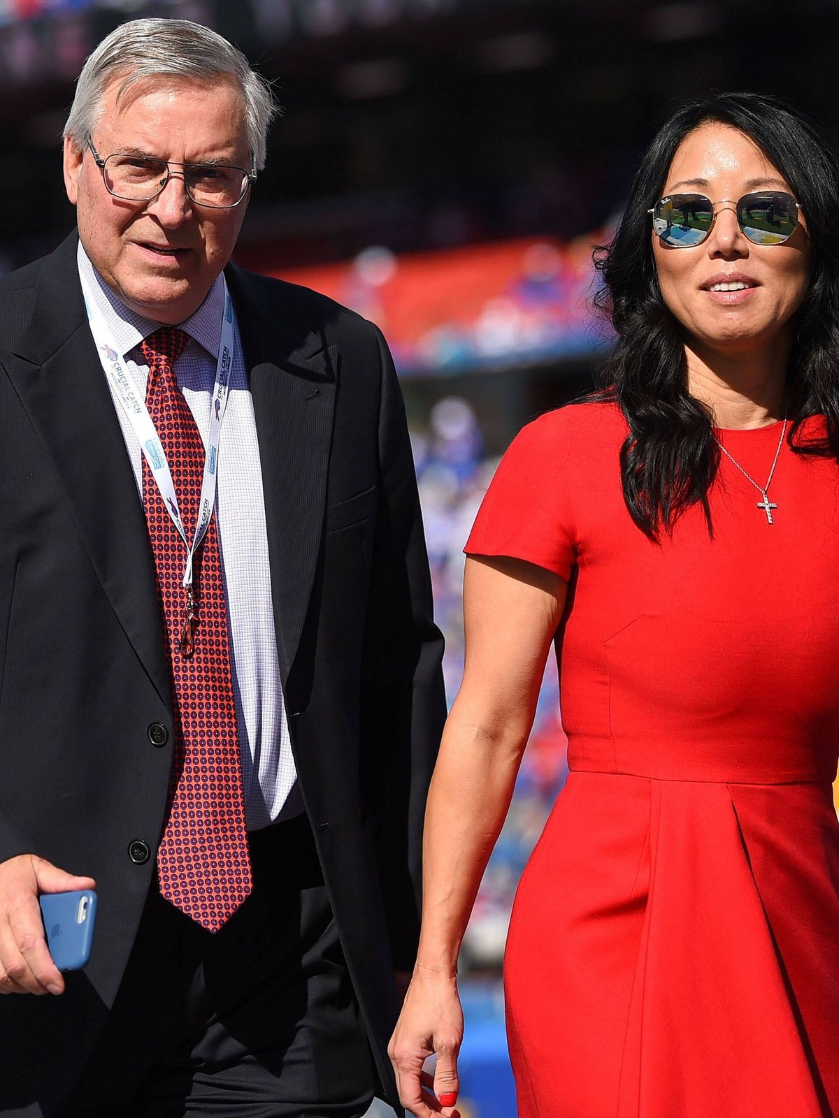 NFL, American Football Herren, USA Miami Dolphins at Buffalo Bills, Oct 20, 2019; Orchard Park, NY, USA; Buffalo Bills owners Terry and Kim Pegula walk on the field prior to the game against the Mi...