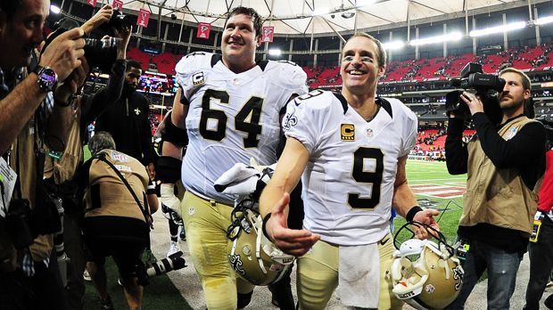 
                <strong>New Orleans Saints</strong><br>
                Drew Brees (Foto, rechts) hält etliche NFL-Rekorde. Er warf in der vergangenen Saison zum fünften Mal in seiner Karriere über 5.000 Passing Yards. Obwohl er bereits 38 Jahre alt ist. Mehr muss nicht gesagt werden. In dieser Saison startet die Passmaschine mit den Saints durch und befindet sich auf Playoff-Kurs. 
              