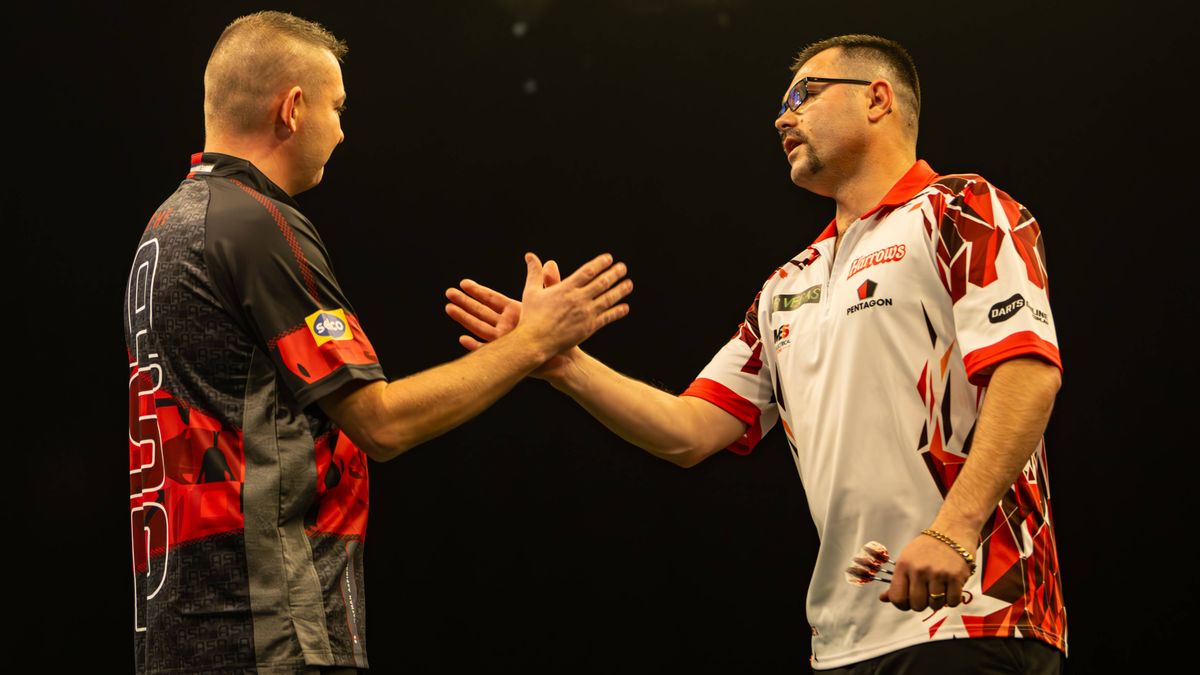 12th November 2023, WV Active, Aldersley, Wolverhampton, England; 2023 PDC Grand Slam of Darts, Day 2 Afternoon Session; Damon Heta congratulates Nathan Aspinall on his victory PUBLICATIONxNOTxINxU...