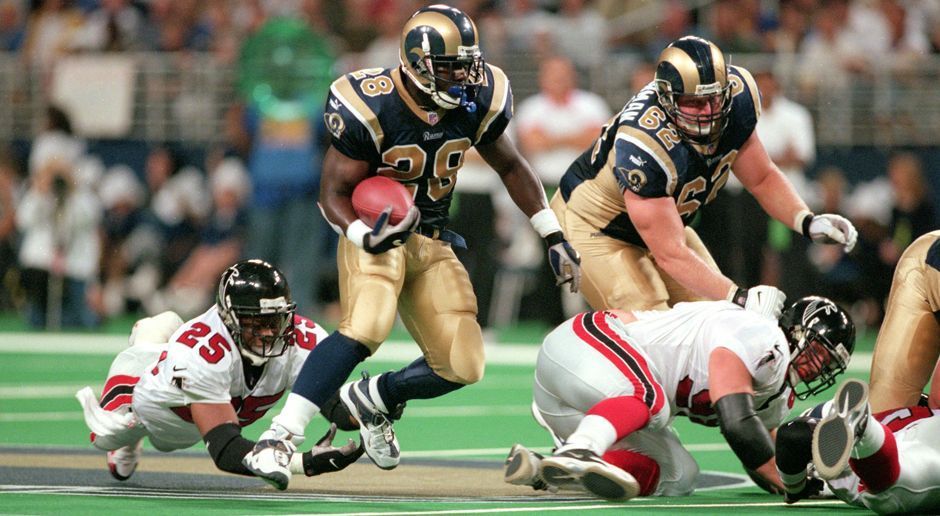 
                <strong>2000: Marshall Faulk (St. Louis Rams)</strong><br>
                2000: Marshall Faulk (St. Louis Rams)
              