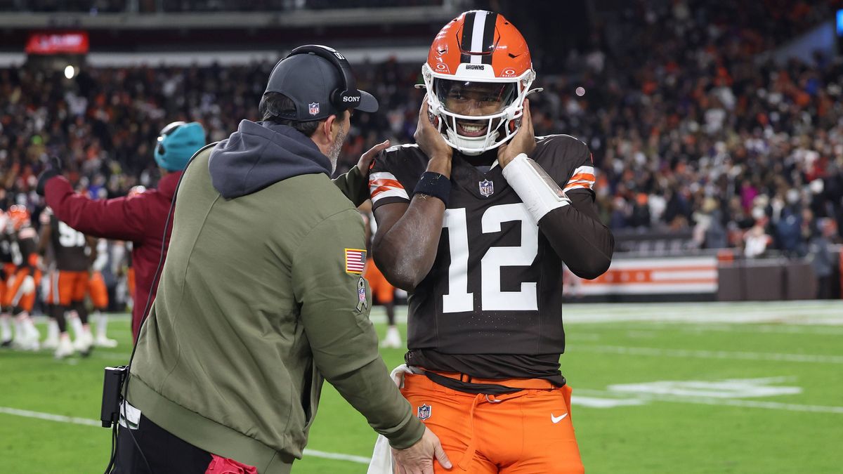 Cleveland Browns head coach Kevin Stefanski talks with Shedeur Sanders (12) after throwing an interception against the Baltimore Ravens during the third quarter at Huntington Bank Field in Clevelan...