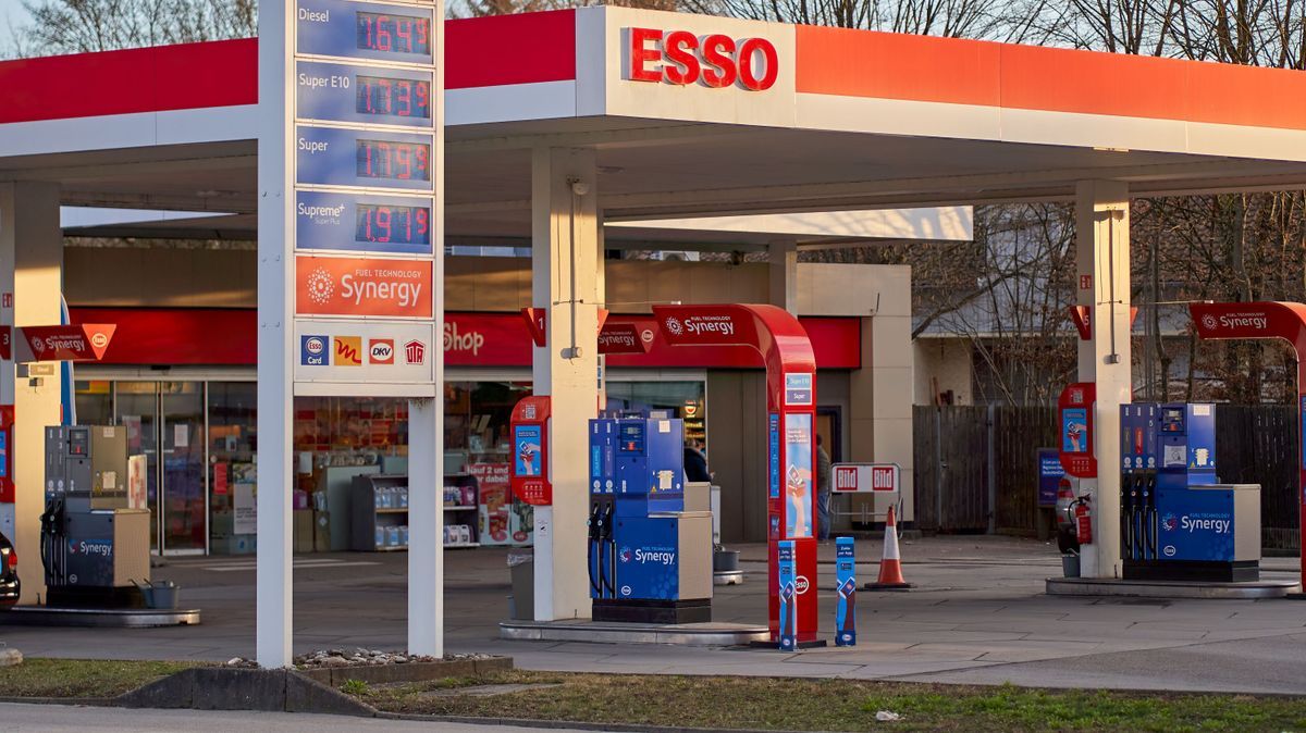 Price display in front of a Esso gas station (tankstelle) at dawn. High and expensive fuel prices in europe.