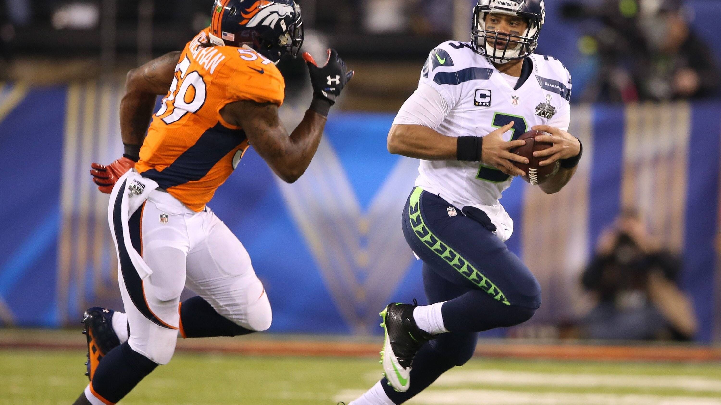<strong>Platz 10: Russell Wilson (Seattle Seahawks)</strong><br>Super Bowl XLVIII <br>Datum: 2. Februar 2014 <br>Ergebnis: Seattle Seahawks 43 - Denver Broncos 8<br>Alter: 25 Jahre, 2 Monate, 4 Tage